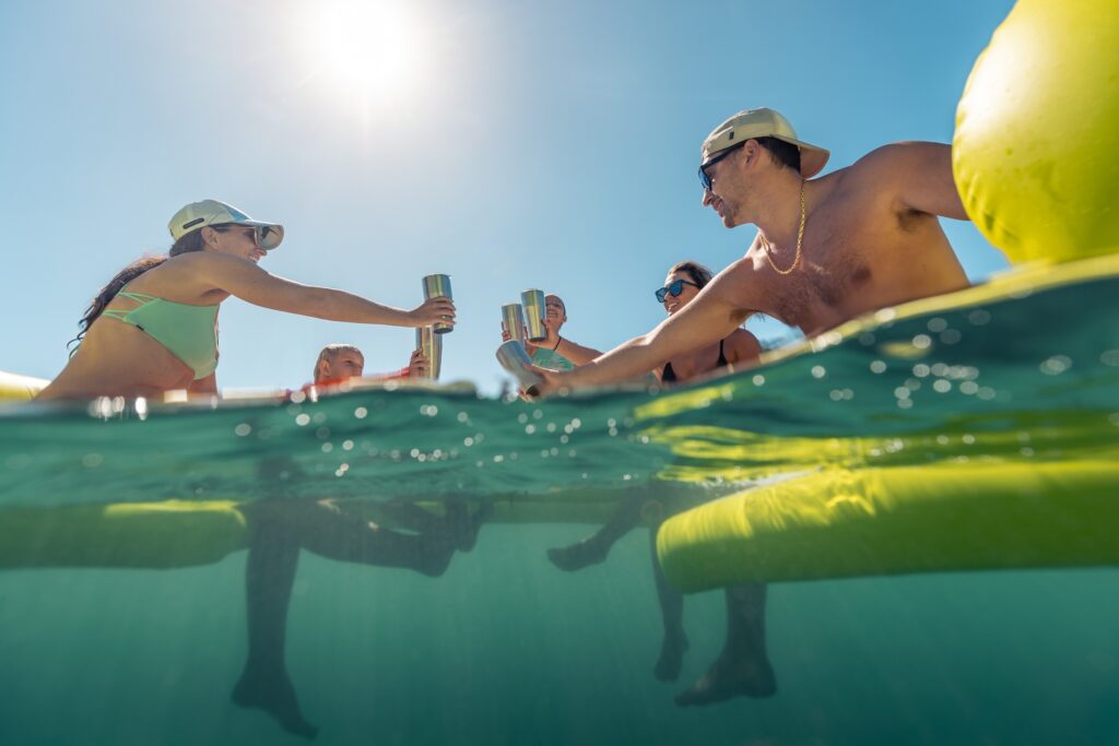 guests at lime out enjoying a drink on st john